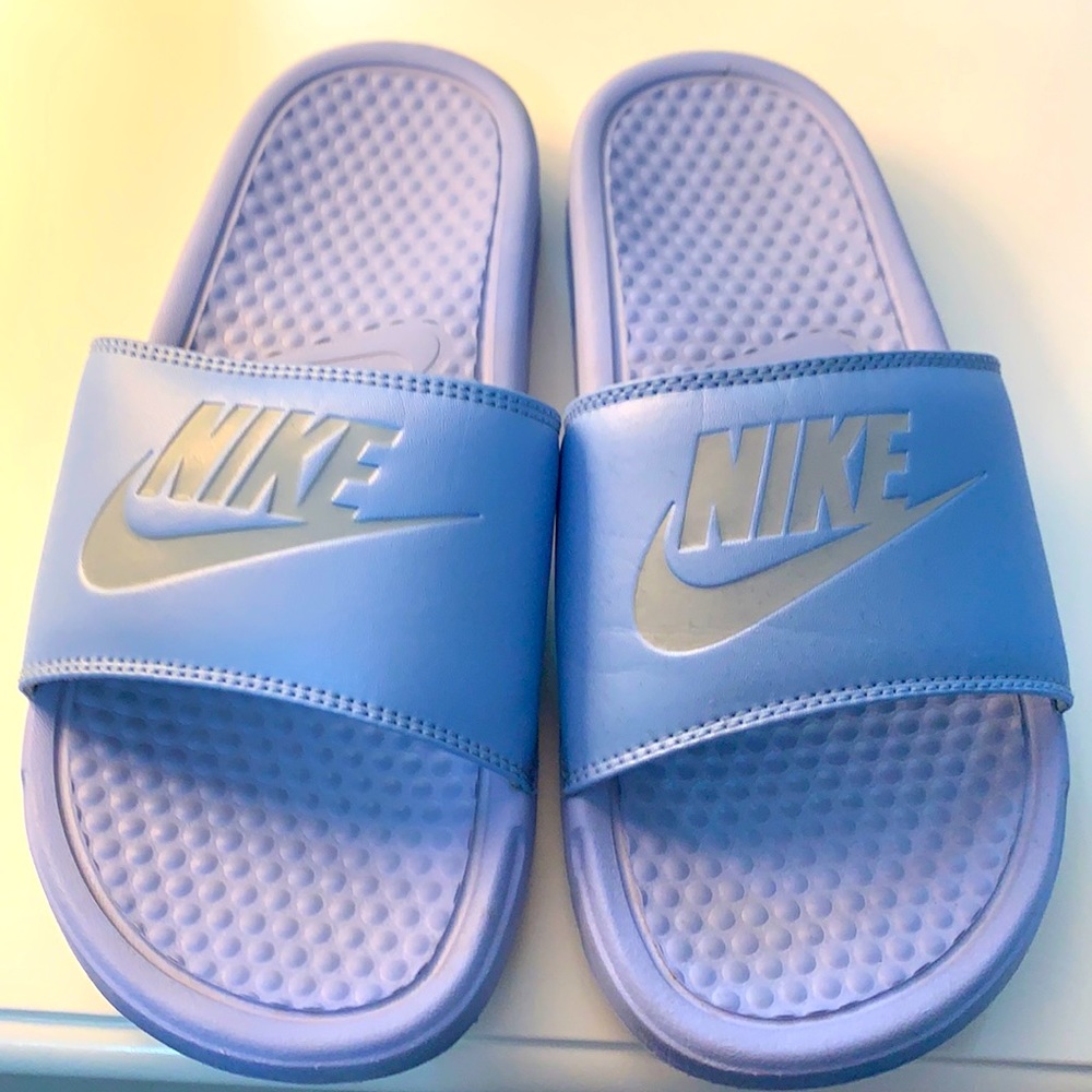 Nike baby blue slides, size 8 woman’s